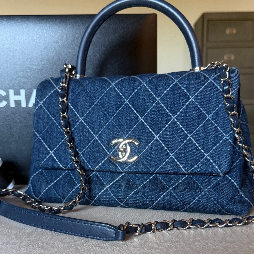 The cutest CHANEL Denim Quilted Top-Handle Shoulder Bag with Silver Hardware